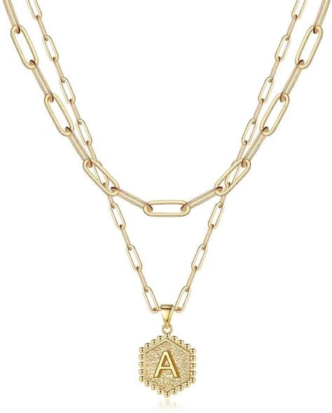 Amazon's Choice for "14k gold cross necklace" +14 colours/patterns. ... Gold Layered Initial Cross Necklace, 14K Gold Plated Layering Square Letter Pendant Figaro Chain Cross Choker from A-Z Capital Jewelry for Women Girls. 4.5 out of 5 stars 2,576. $26.59 $ 26. 59. $5.05 delivery Wed, Feb 21 .